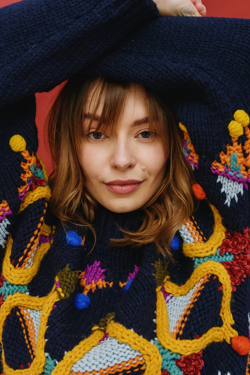 Woman in Bright Knitted Sweater